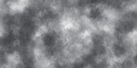 Dark abstract black and white texture of smoke and a stormy cloudscape with motion