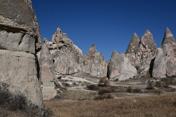 Fototapeta premium Volcanic Rock Formations and Cave Houses in Cappadocia, Turkey