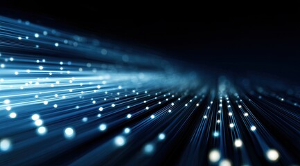 Abstract digital stream.  A dynamic,  glowing stream of light and points of light streaks across a dark background