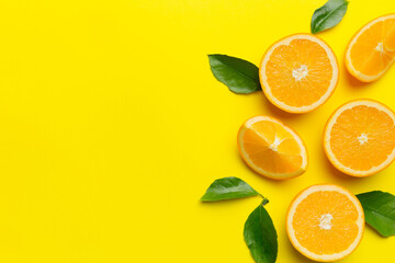 fresh Fruit orange slices on colored background. Top view. Copy Space. creative summer concept. Half of citrus in minimal flat lay with copy space
