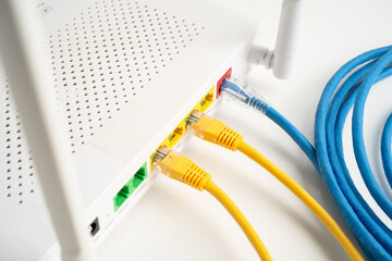 Ethernet cable with wireless router connect to internet service provider network.