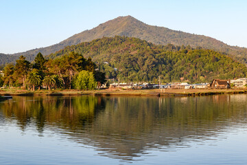 Mount Tamalpais, also known as Mt. Tam, a peak in Marin County, northern California, reflected in the still water of Corte Madera Creek.