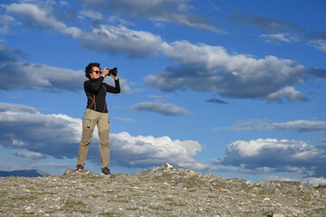 Female tourist in the mountains