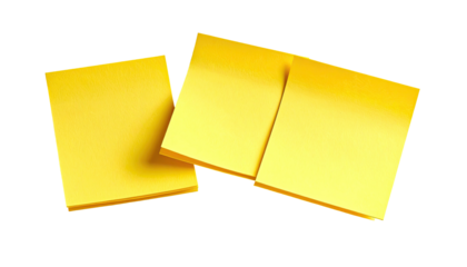 Stack of bright yellow square sticky notes on a black background