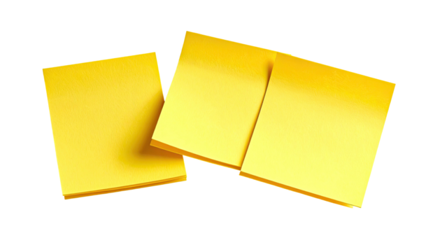 Stack of bright yellow square sticky notes on a black background