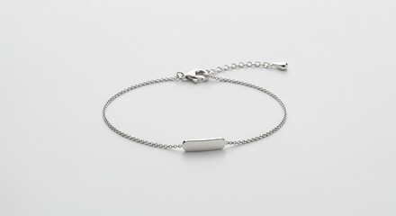 Minimalist silver chain bracelet features a slender horizontal bar centerpiece on a white background