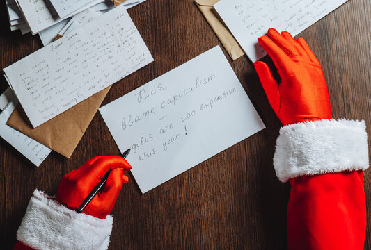 Santa Claus writing a humorous letter about expensive gifts and capitalism