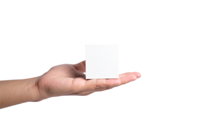 Hand holding a blank card, ready for any message or design. It's an invitation for creativity and self-expression