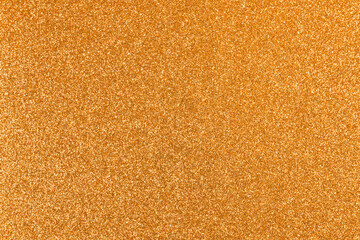 Fototapeta premium Abstract Sparkling Orange Glitter Background - Holidays And Glamour