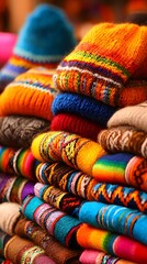 filled with handwoven textiles in bold reds, yellows, and blues stacked in neat piles