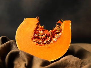 Pumpkin Slice Macro on Dark Fabric