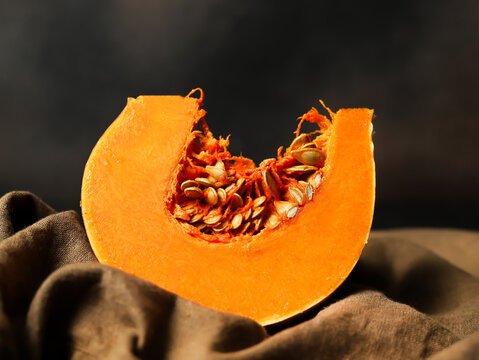 Pumpkin Slice Macro on Dark Fabric