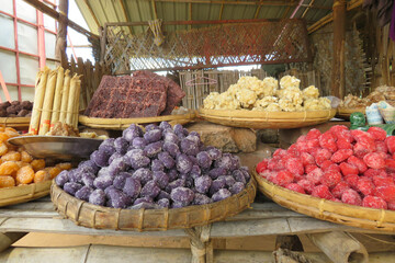 Colourful sweets made of palm sugar for sale at a market stall in Bagan, Myanmar