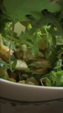 fall pear salad with blue cheese preparation close up