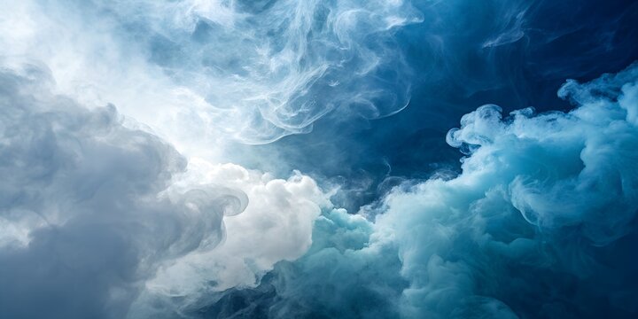 Dramatic swirling clouds in a deep blue sky with bright white highlights and ethereal light