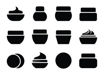 Assortment of black cosmetic cream jars
