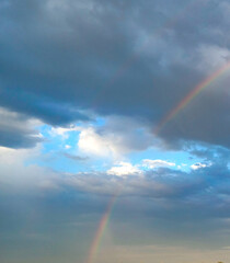 rainbow in the sky,, dark blue sly view