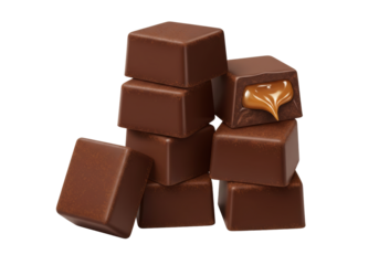Isolated chocolate caramels stacked in pile, square candies with soft caramel filling center
