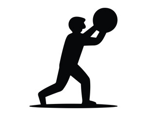 Silhouette of a person holding a large ball