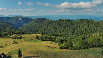 Obraz premium Mountains, hills and meadow, village in Tara park