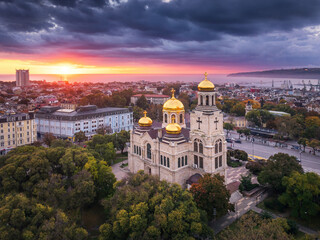 Sunrise above Varna city, Bulgaria and The Cathedral of the Assumption, cityscape panoramic aerial view