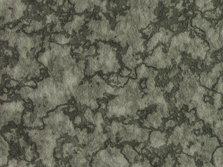Rocky surface with uneven dark and light textures, showcasing natural patterns.