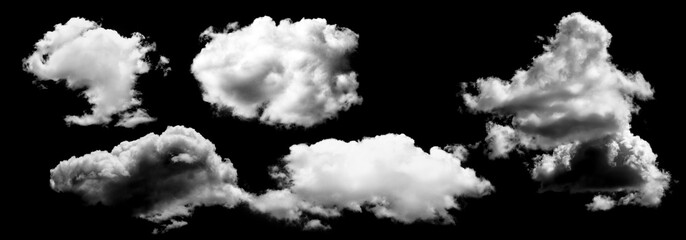 Fluffy white clouds isolated on black background, showcasing various shapes and textures