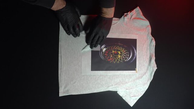 digital printing technology on textiles direct to film at home transferring an image from film to a t-shirt or fabric black outline of a car disc