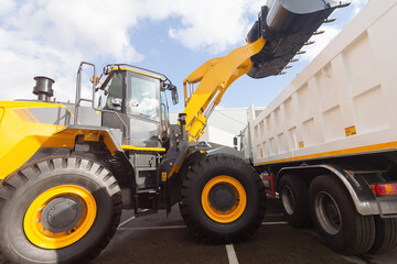 New bulldozer and dump truck on the exhibition site