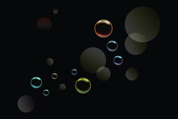 Floating soap bubbles on dark background – colorful bokeh spheres