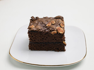 Chocolate cake or chocolate steamed brownie on white background