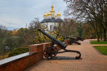 Church and cannons in autumn on Vala in Chernihiv