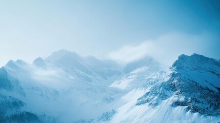 Fototapeta premium Serene snow-covered mountains in a peaceful landscape