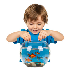 A young boy smiles while feeding golden fish in a clear glass bowl, showcasing playful interaction and curiosity