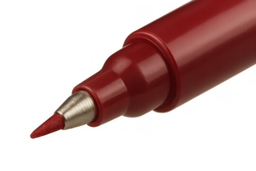 Red felt-tip pen showing its writing tip in close-up, perfect for art, creativity, education, and office work