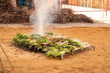 Bow parel, Calçots on Fire: Authentic Catalan Experience. Grilled Calçots at Catalan Festival  in Valls, Spain 26.01.2025