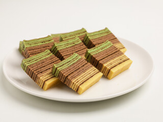 Lapis Legit or thousand layer cake on white background