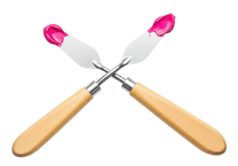 Isolated paint spatulas crossed with pink paint - wooden handle, artist studio, crafting