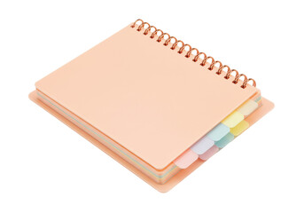 Isolated peach-colored spiral-bound notebook with pastel-colored dividers on desktop surface