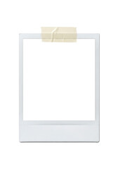 Blank square instant photo print frame taped to a surface with a single strip of masking tape isolated on a clean transparent background