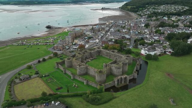 Beaumaris⁩, Wales, Castle Slow Orbit with town and Manai Strait in the background