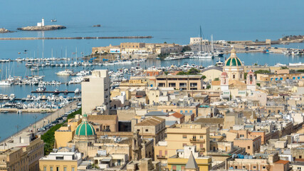 Obraz premium Aerial view of the rooftops of houses and buildings in the historic center of Trapani, Sicily, Italy. 