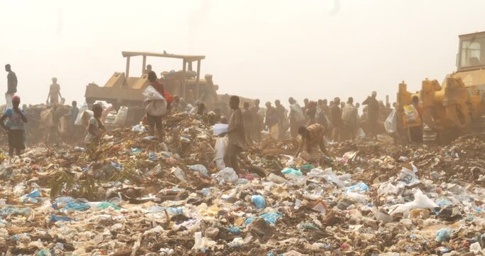 PEOPLE IN THE TRASH, SANITARY LANDFILL OF VIANA, LUANDA, ANGOLA 
