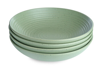 Stack of green ceramic bowls isolated on white