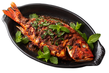  a black serving dish with a whole fried or charred red snapper on it, seasoned with indian-style spices and herbs, against a Transparent Background PNG