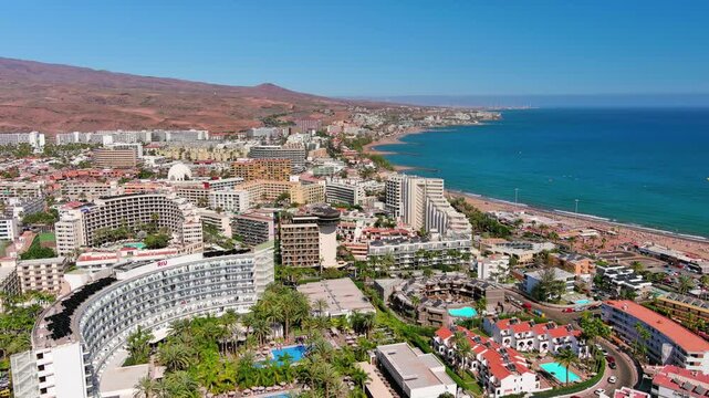 Maspalomas, Gran Canaria, Canary Islands, Spain: Aerial view of English beach (Playa del Ingl&eacute;s), perfect for travel and tourism marketing - landscape panorama of  Atlantic Ocean islands from above
