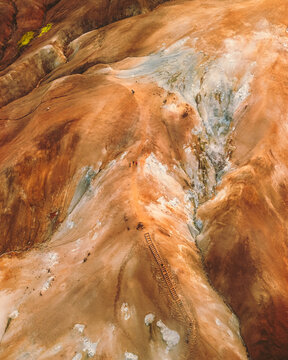 Aerial view of a Martian landscape where ochre and cream-colored earth meet in stark contrast, sculpted by time and weather, Kerlingarfj&Atilde;&para;ll, Hrunamannahreppur, Iceland.