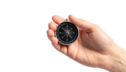 A hand holding a silver compass, guiding the way, with a sense of adventure and direction. The compass shows the cardinal points.