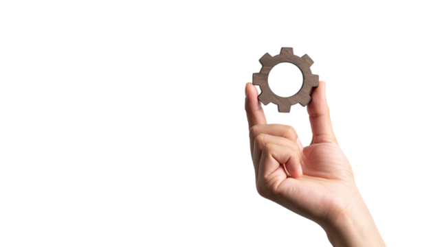 A hand delicately holding a gear, symbolizing industry and process