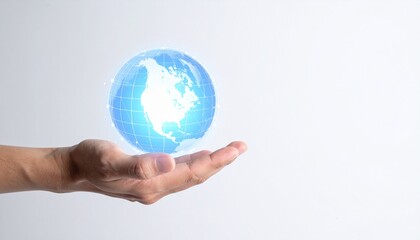A hand is holding a glowing globe, symbolizing the interconnectedness and protection of our planet. The globe emanates a bright light.
